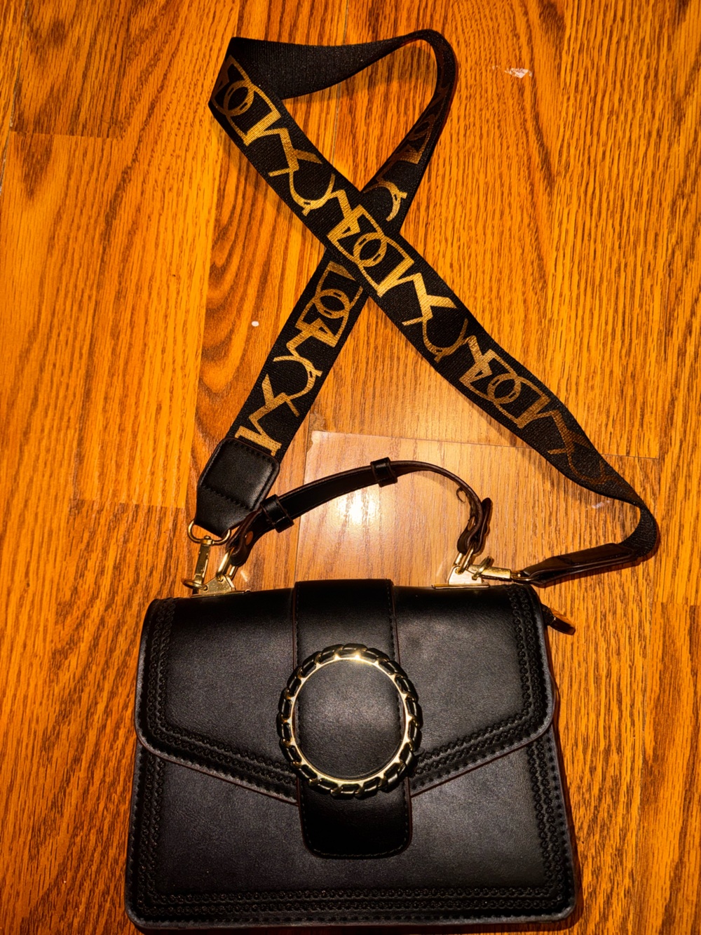 Black Women's Crossbody Bag with Decorative Gold Ring